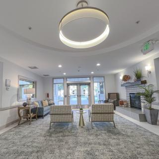 A modern and cozy lobby interior with comfortable seating and stylish decor.