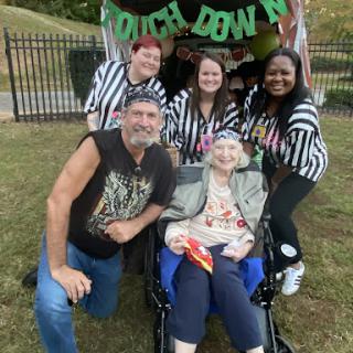 A joyful gathering celebrating togetherness at an outdoor event!
