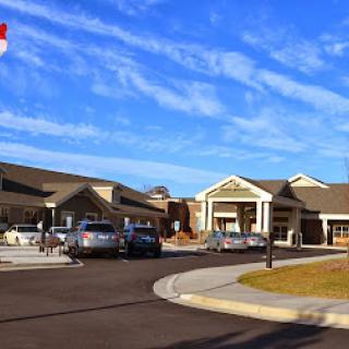 A modern healthcare facility on a clear sunny day.