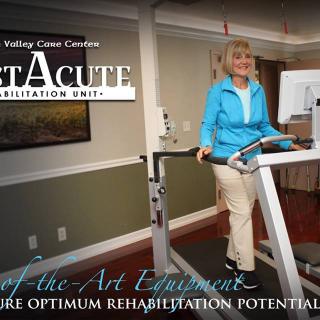A woman standing on a rehabilitation treadmill in a healthcare facility.