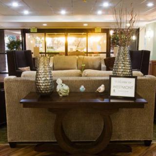 A cozy living room with elegant decor and comfortable seating.
