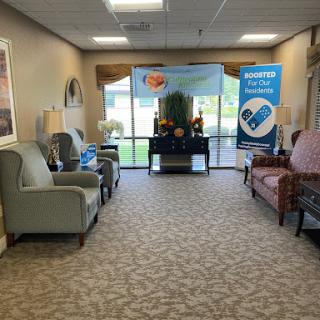 A cozy waiting area featuring comfortable seating and natural light.
