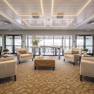 A modern lobby with comfortable seating and ample natural light.