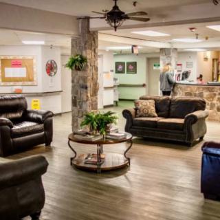 A cozy lobby with comfortable seating and a welcoming reception desk.