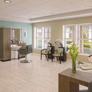 A modern and spacious hair salon with stylish interior design, featuring chairs, mirrors, and large windows.