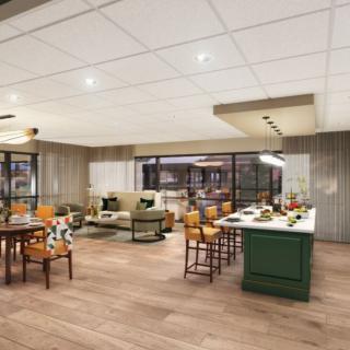 A modern open-concept living room and kitchen with stylish furniture.