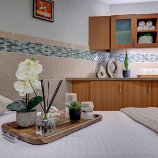 A serene and stylish bedroom setup featuring elegant decor and soothing colors.