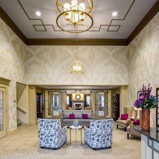 A luxurious lobby with stylish furniture and elegant lighting fixtures.