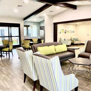 A modern lobby with stylish seating and bright decor.