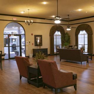 A cozy and elegant lobby with comfortable seating and warm lighting.
