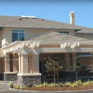 A suburban house with well-maintained landscaping.