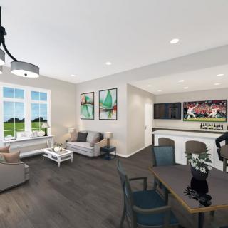 A modern open-plan living and kitchen area with stylish furniture and decor.