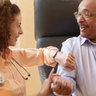 A doctor and a patient engaging in a consultation.