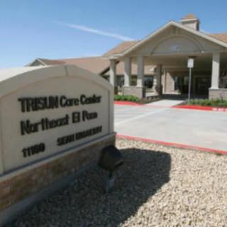 Entrance of a care center with sign indicating Northeast El Paso location.