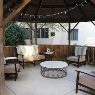 A cozy outdoor gazebo designed for relaxation and gatherings.