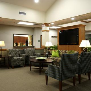 A modern lobby with comfortable seating and ambient lighting.