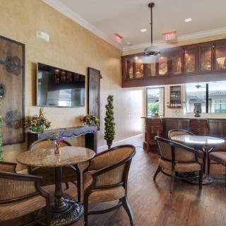 A cozy living room with elegant wooden furniture and decor.