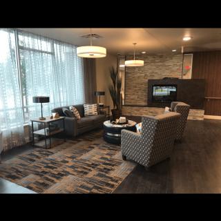 A modern lounge area with comfortable seating and stylish decor.