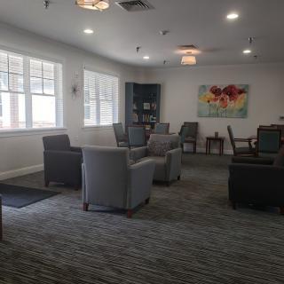 A cozy lobby area with comfortable seating and natural lighting.