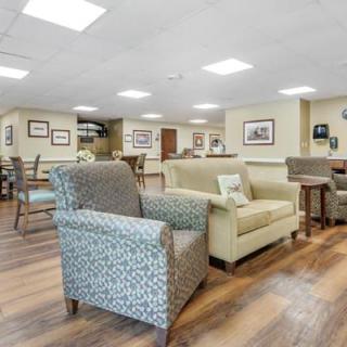 A cozy living room with comfortable seating and modern decor.