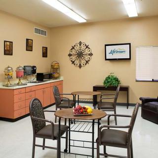A cozy break room with seating and refreshments.