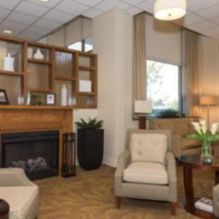 Cozy living room with a fireplace and comfortable seating.