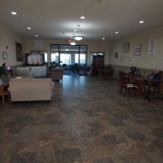 A spacious lobby with comfortable seating and modern decor.