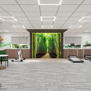 A modern gym interior featuring treadmills and exercise equipment with a decorative greenery mural on the wall.