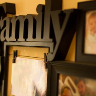 A cozy display of family memories framed on a wall.