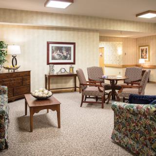 Cozy living room with comfortable seating and elegant decor.