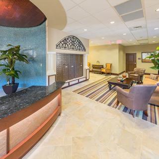 A modern lobby with comfortable seating and elegant interior design elements.