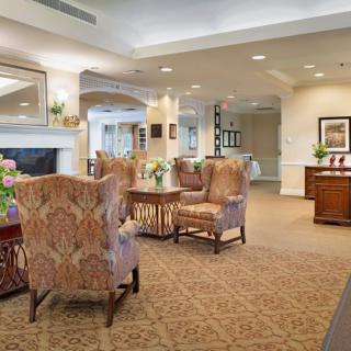 A cozy and well-decorated living area with comfortable seating and elegant furnishings.
