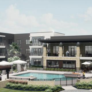 A modern apartment complex featuring an outdoor pool and landscaped surroundings.