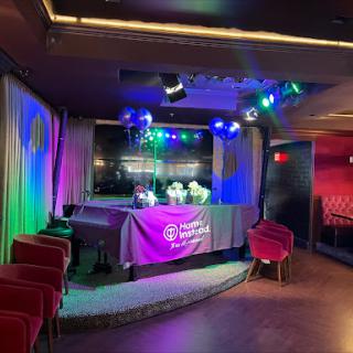 A vibrant nightclub stage ready for an evening of entertainment.