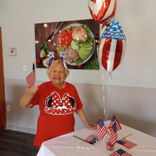 A joyful celebration with patriotic decorations.