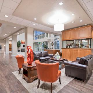 A modern and cozy lobby with comfortable seating and stylish decor.