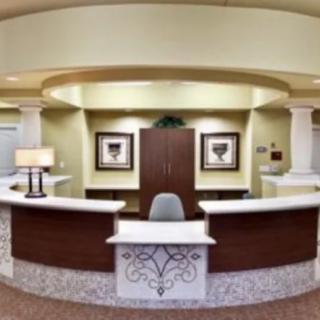 A modern reception desk with elegant interior design in an office lobby.