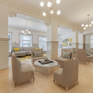 A modern living room with elegant furniture and stylish lighting.
