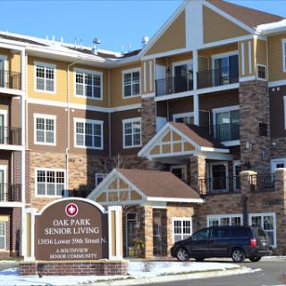 A senior living community featuring modern architecture and snowy surroundings.