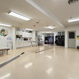 A clean and sterile veterinary clinic with medical equipment and bright lighting.