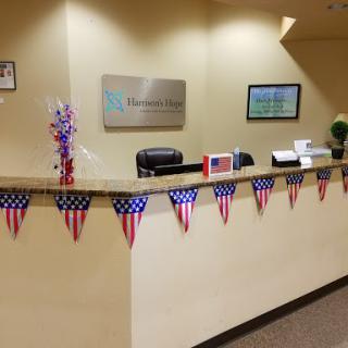 A festive reception area decorated with American flag bunting.