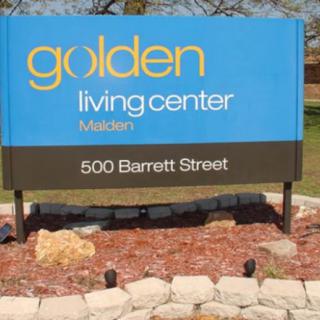 Sign for Golden Living Center located at 500 Barrett Street in Madison.