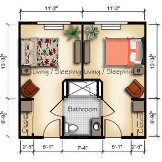 A floor plan of a studio apartment with two living/sleeping areas and a central bathroom.