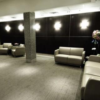 A modern lobby with comfortable sofas and ambient lighting.