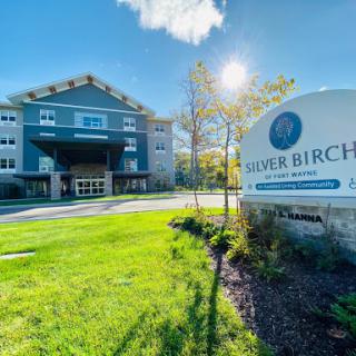A bright and inviting view of Silver Birch Community, showcasing its modern architecture and welcoming environment.