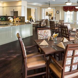 A beautifully arranged dining area with neatly set tables and elegant decor.