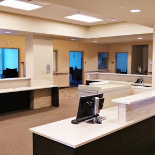 A modern and bright office reception area with clean lines and an inviting atmosphere.