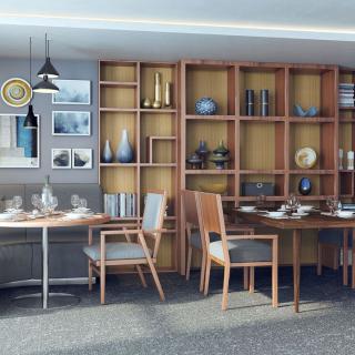 A modern dining room with wooden furniture and decorative shelving.