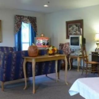 A cozy living room with classic furnishings and decor.