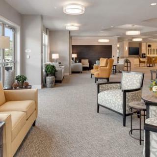 A modern and spacious lobby area with comfortable seating and natural lighting.